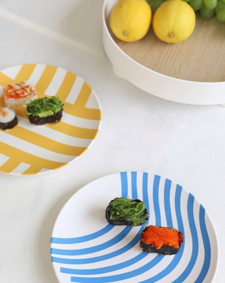 Whimsical Dopamine Bamboo Fiber Plates Set featuring blue and yellow striped designs, perfect for eco-friendly dining.