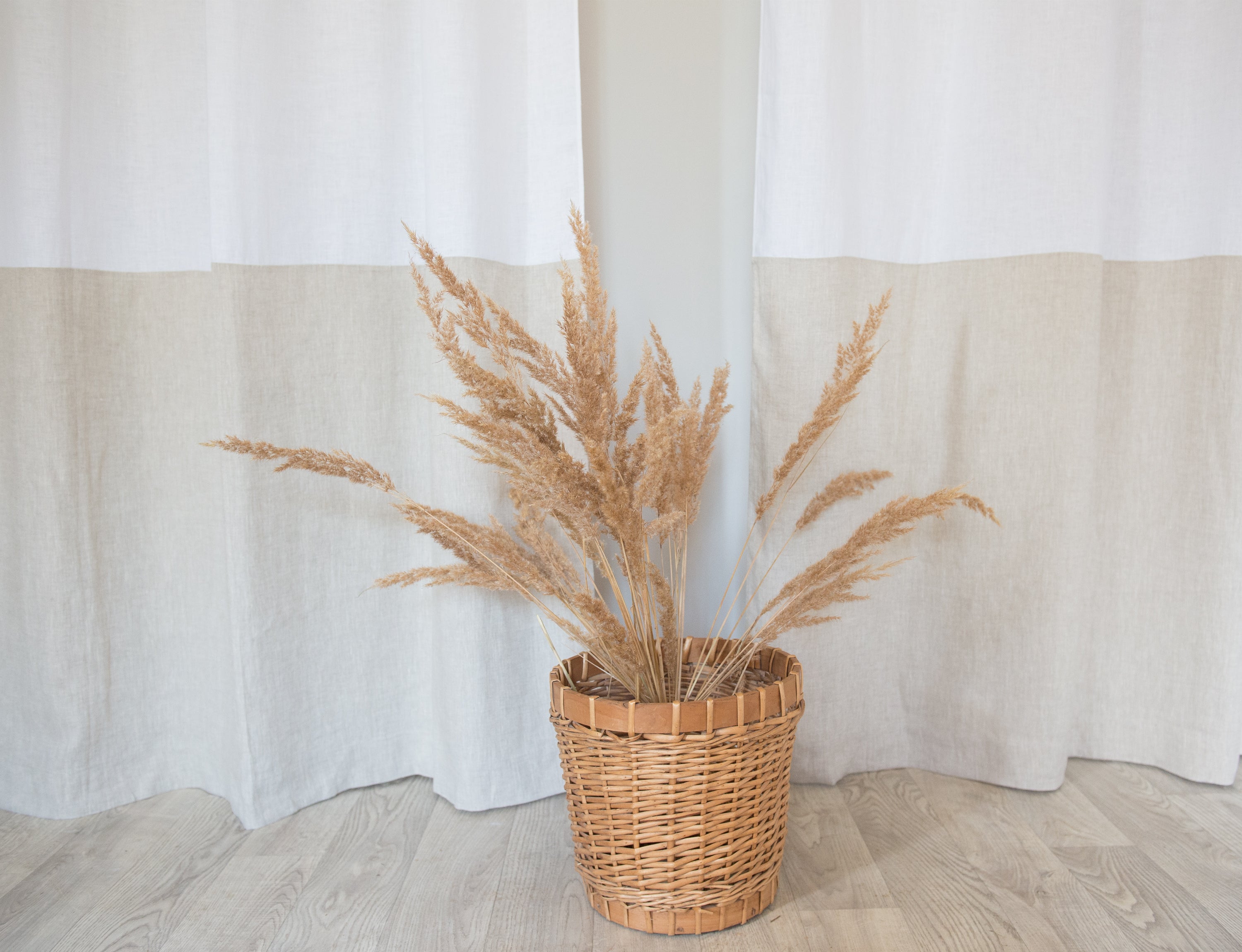 Elegant White and Natural Light linen curtains with tab tops, showcasing a stylish two-tone design for modern interiors.