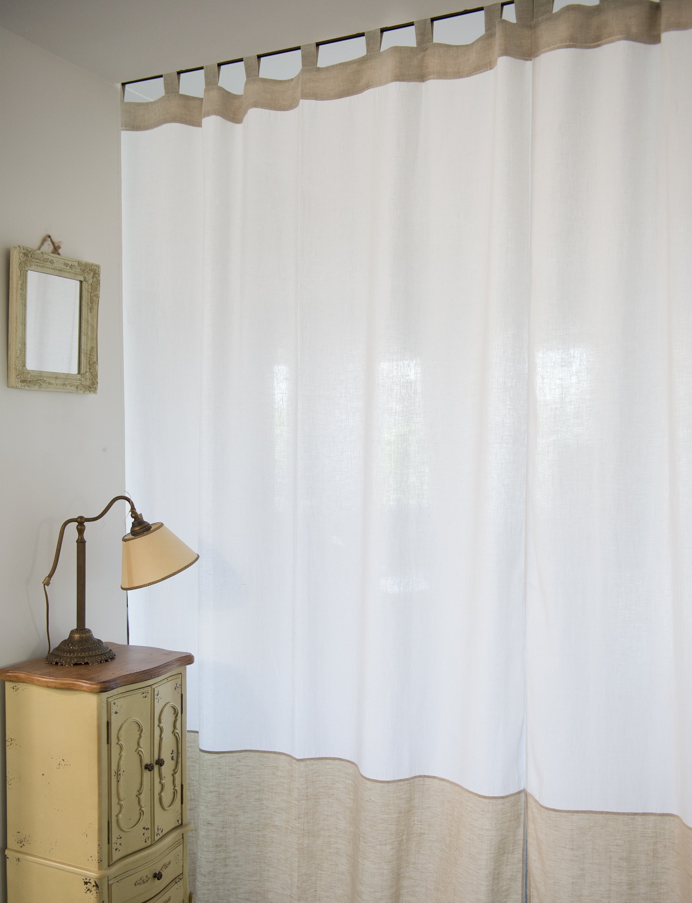 Elegant White and Natural Light linen curtains with tab tops, showcasing a stylish two-tone design for modern interiors.