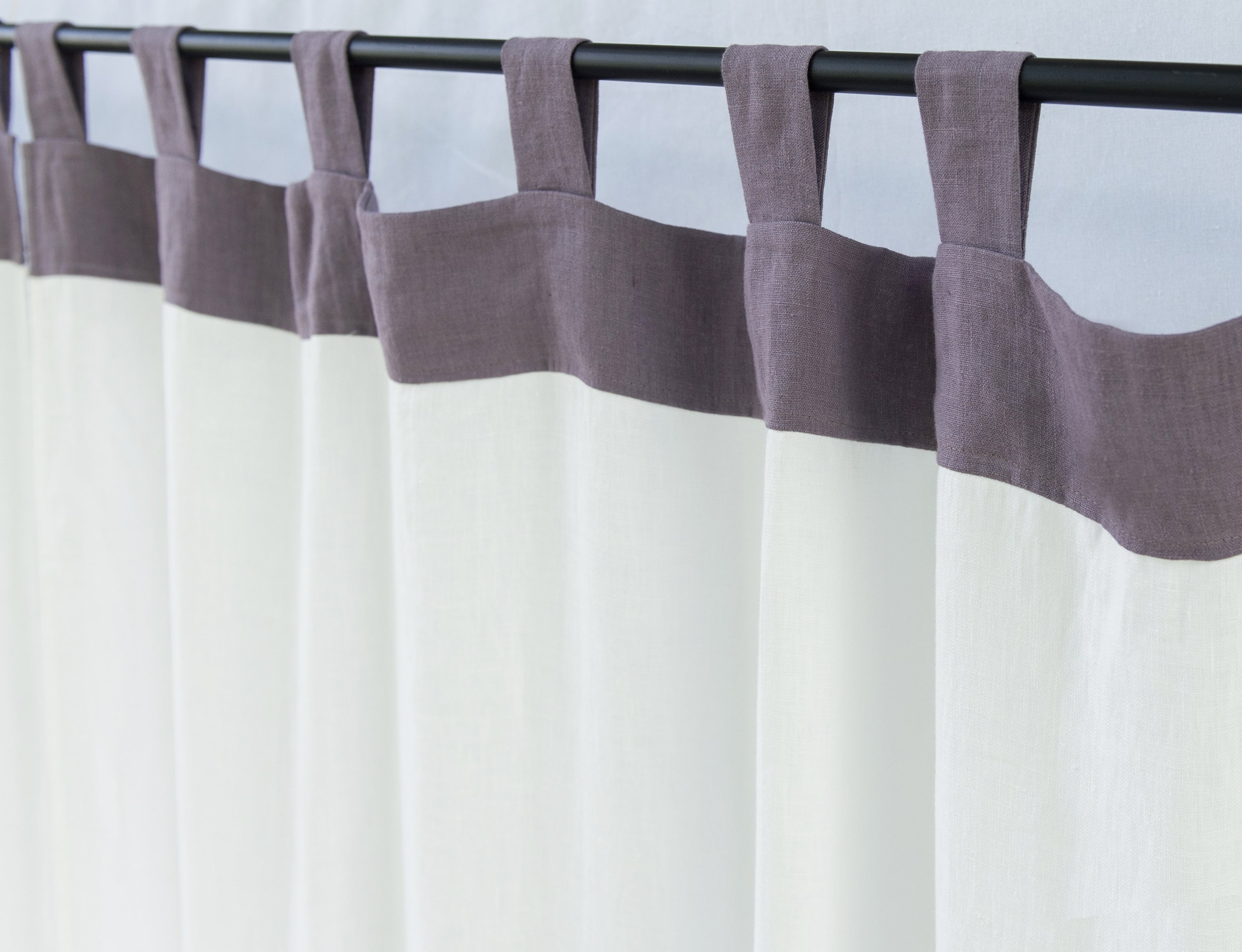 Elegant White and Natural Light linen curtains with tab tops, showcasing a stylish two-tone design for modern interiors.