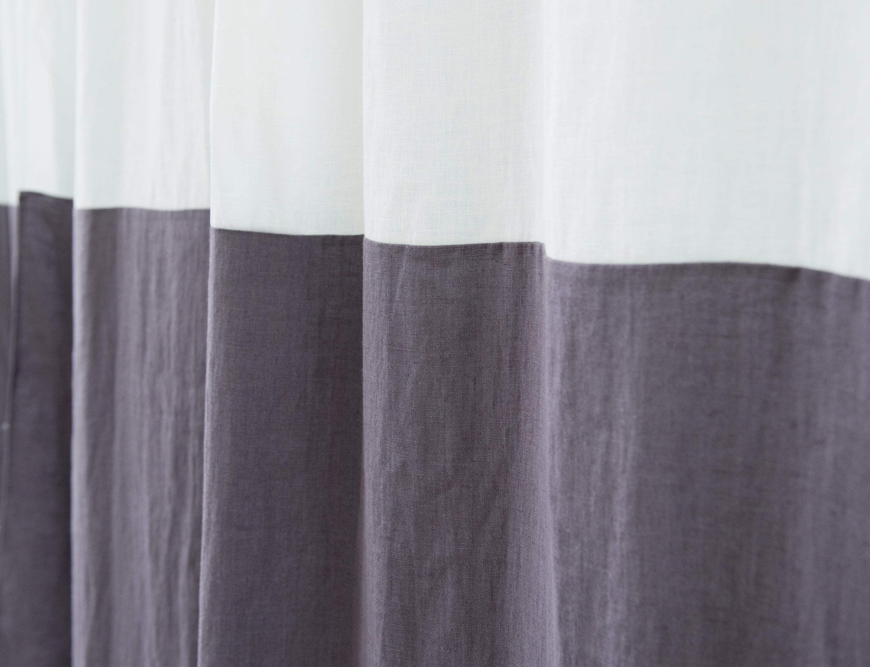 Elegant White and Natural Light linen curtains with tab tops, showcasing a stylish two-tone design for modern interiors.