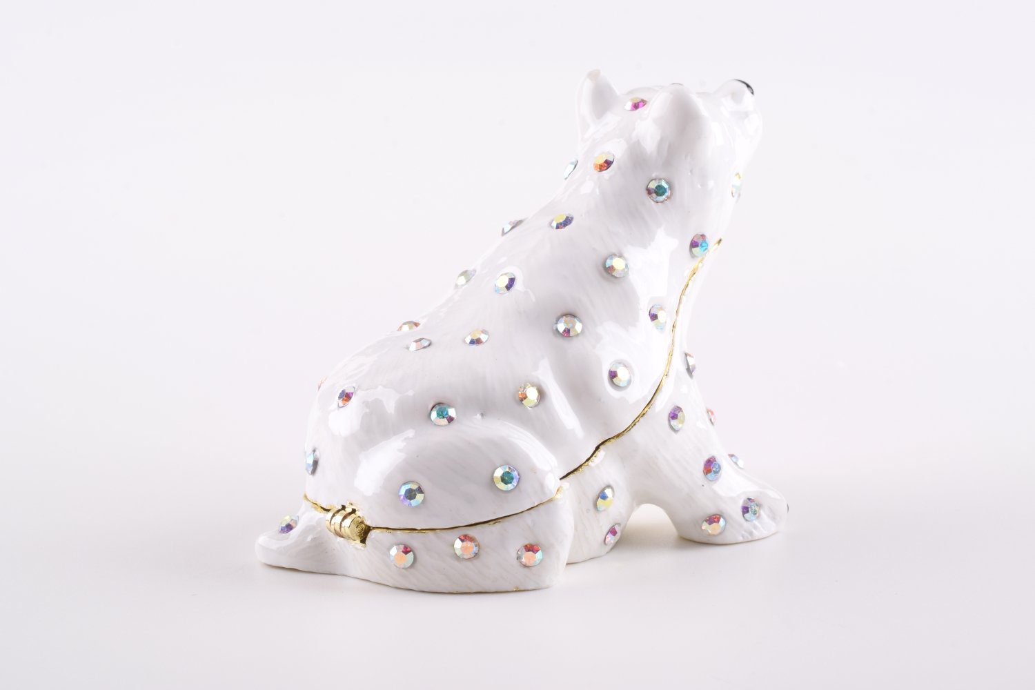 A beautifully handcrafted White Bear trinket box adorned with Austrian crystals and plated with 24K gold, showcasing intricate details and a secure magnetic closure.