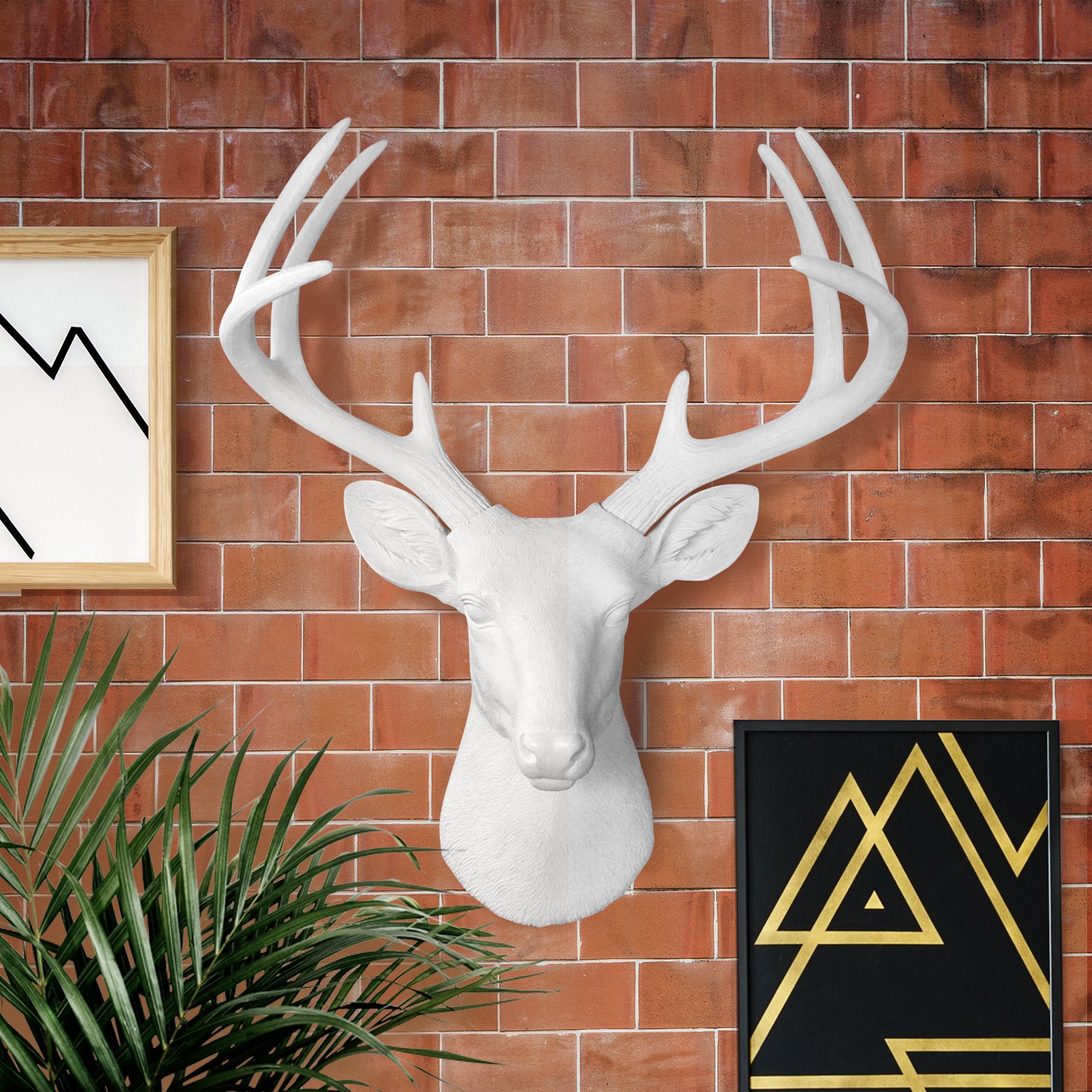 Stylish 21-inch white faux deer head wall decor with antlers, crafted from eco-friendly resin.