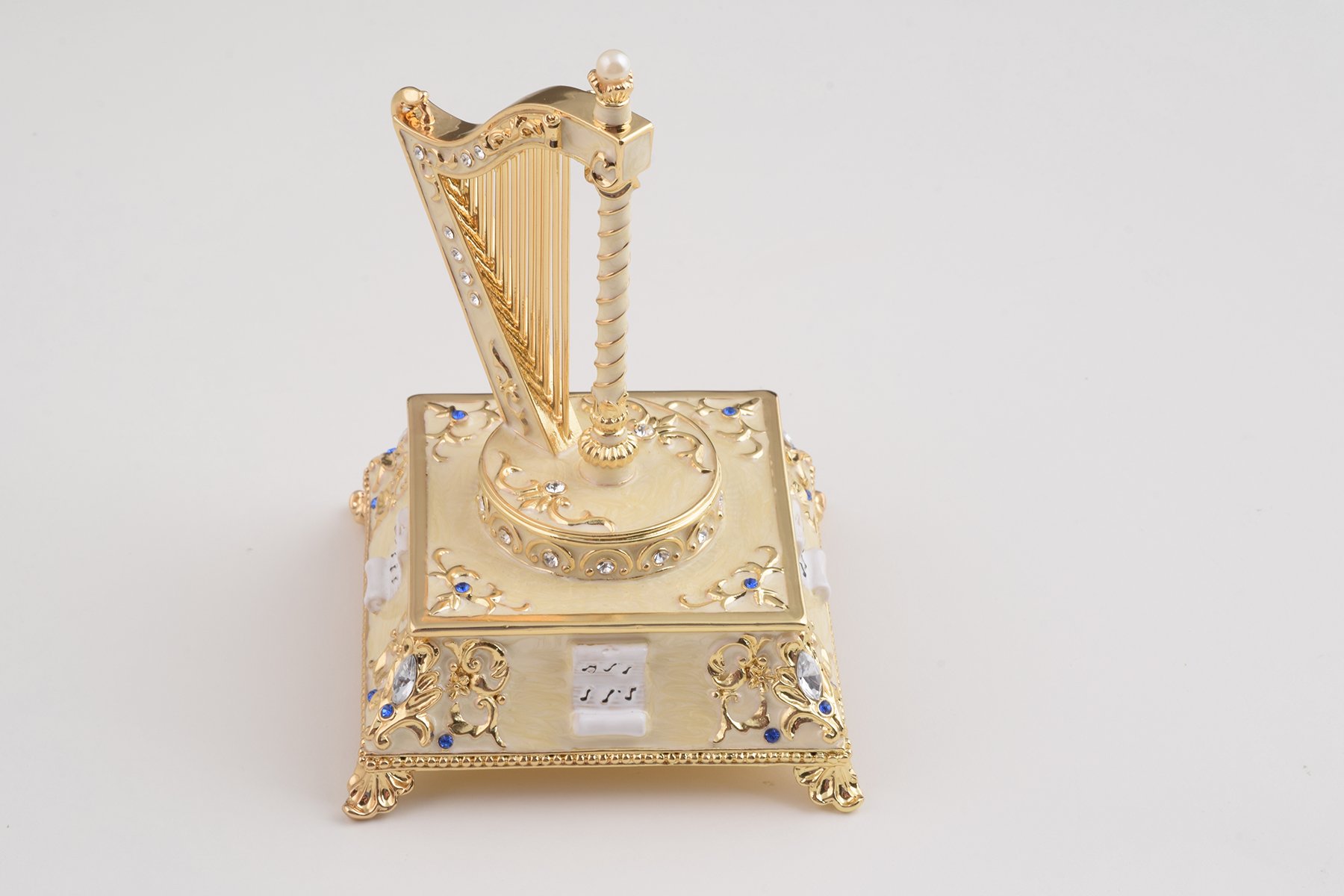 Elegant White Harp trinket box with enamel painting and Austrian crystals, showcasing intricate craftsmanship and luxurious gold or silver plating.