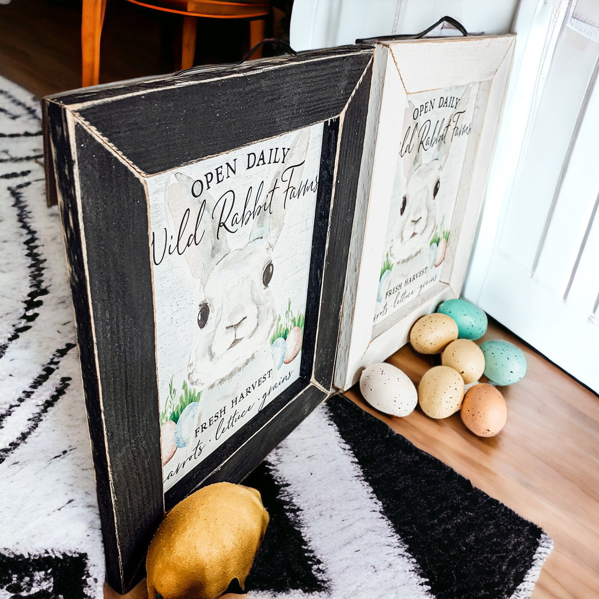 Wild Rabbit Farms Easter sign featuring a rustic design with pastel eggs and a hand-painted wooden frame.