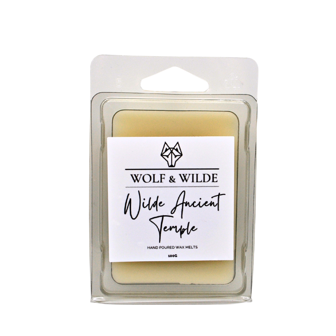 Wilde Ancient Temple Soy Wax Melts in a decorative packaging, showcasing the rich woody sandalwood fragrance with warm spices.