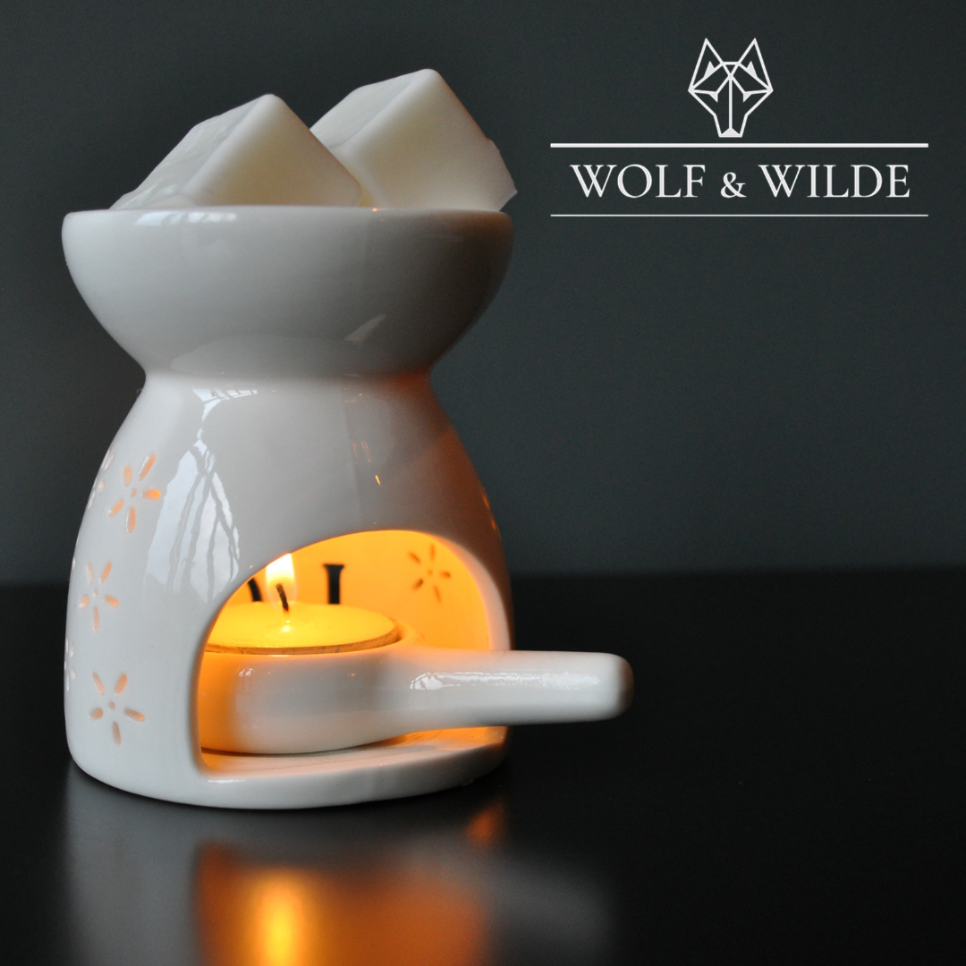 Wilde Ancient Temple Soy Wax Melts in a decorative packaging, showcasing the rich woody sandalwood fragrance with warm spices.