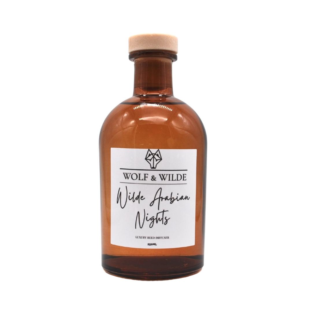 Wilde Arabian Nights Apothecary Reed Diffuser in an amber bottle with natural reeds, showcasing its luxurious design and eco-friendly materials.