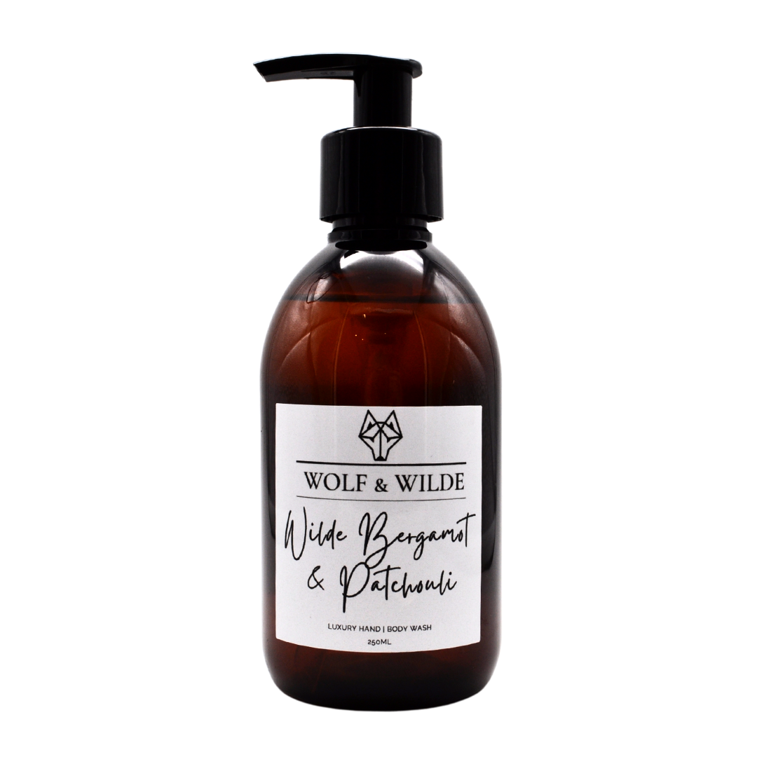 Wilde Bergamot & Patchouli Luxury 2 In 1 Liquid Soap in a recyclable amber bottle, showcasing its elegant design and rich texture.