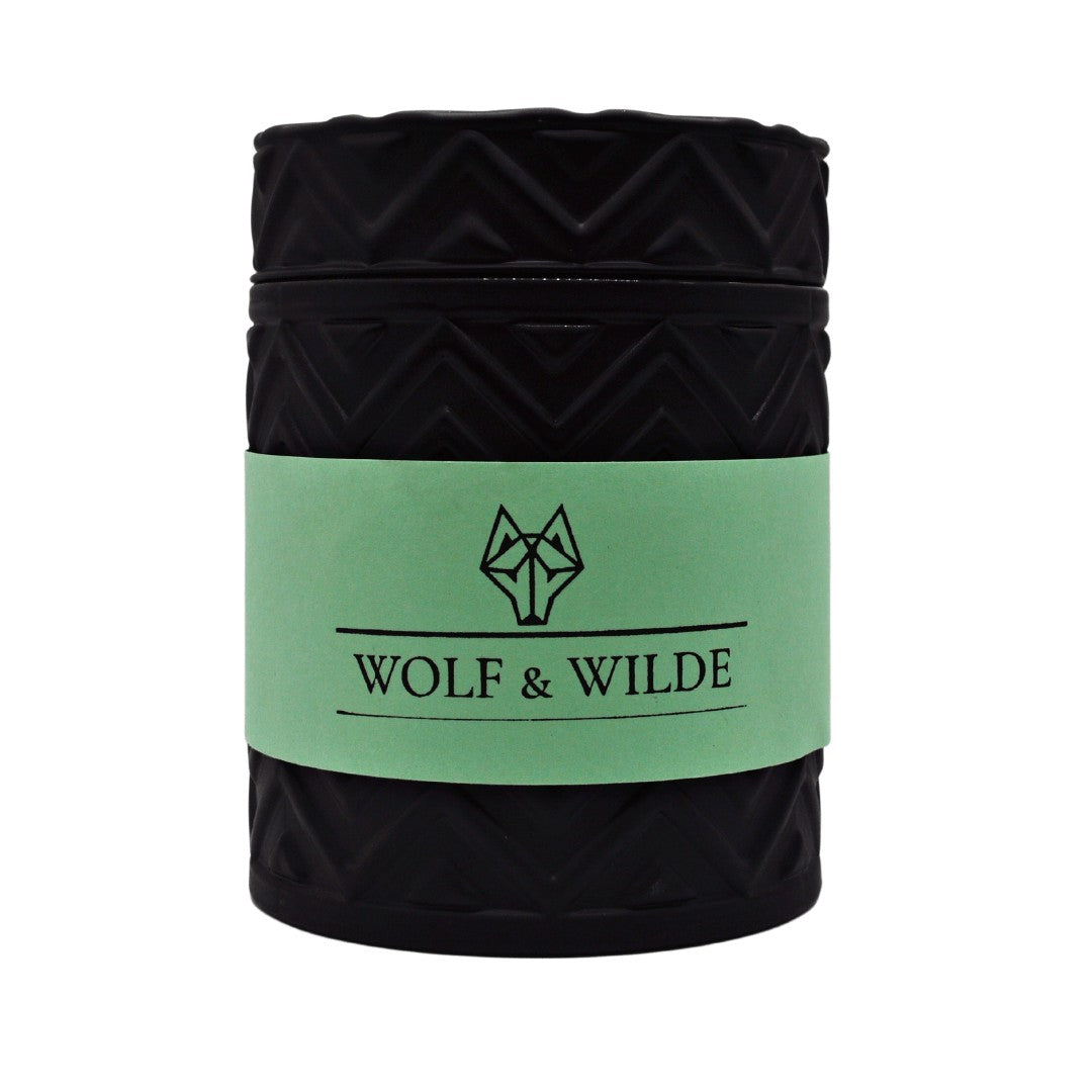 Wilde Enchantment Luxury Aromatherapy Scented Candle with elegant design and natural materials, showcasing its luxurious appeal.