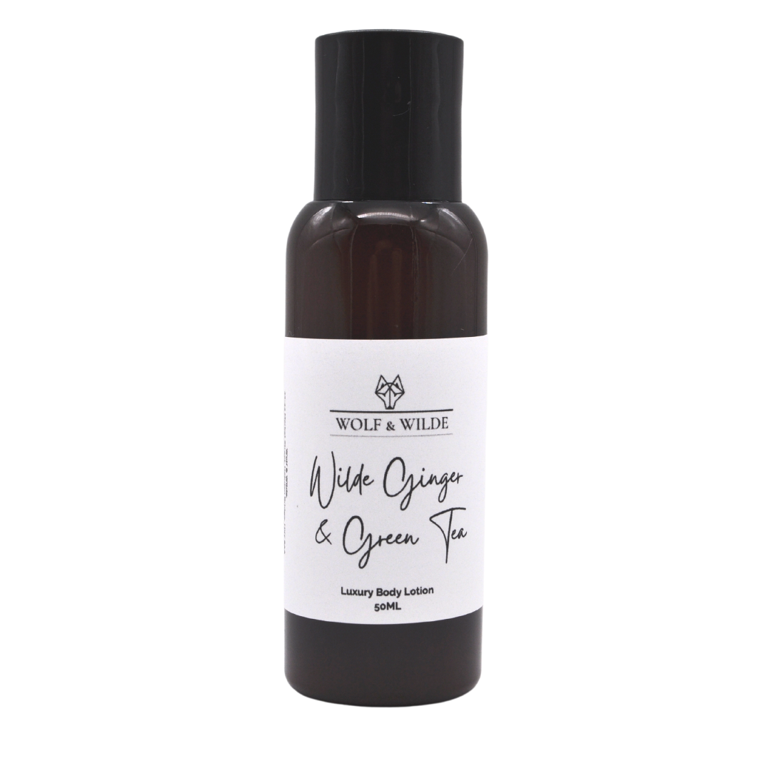 Wilde Ginger & Green Tea Travel Size Luxury Body Lotion in a recyclable Amber PET bottle, showcasing its elegant design and eco-friendly packaging.