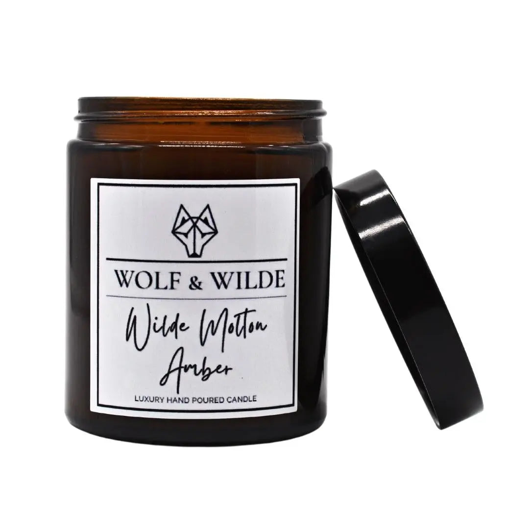 Wilde Molten Amber Luxury Aromatherapy Scented Candle with rich amber and floral notes, elegantly packaged for a luxurious experience.