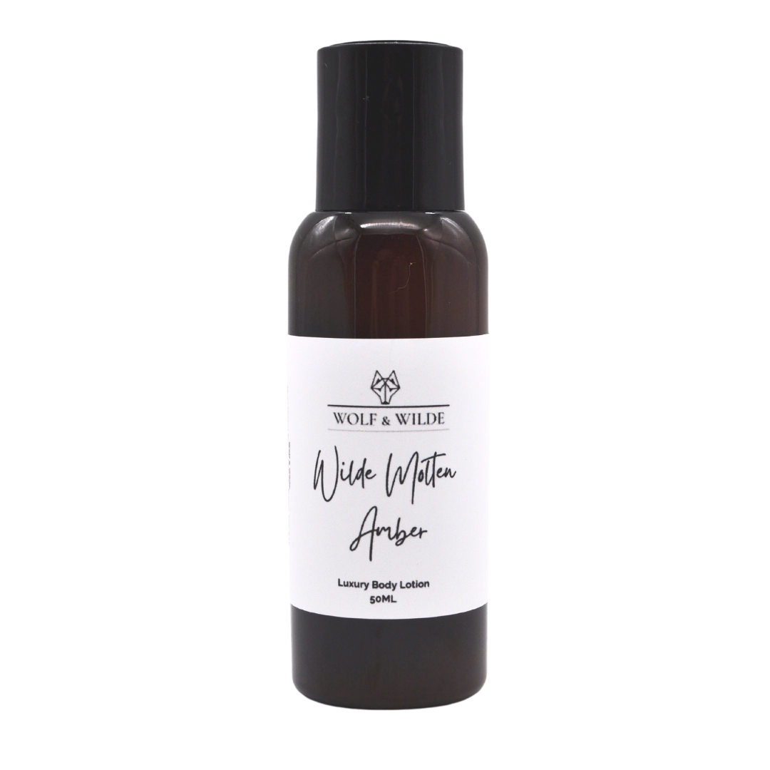 Wilde Molten Amber Travel Size Luxury Body Lotion in a recyclable amber PET bottle, showcasing its elegant design and eco-friendly packaging.