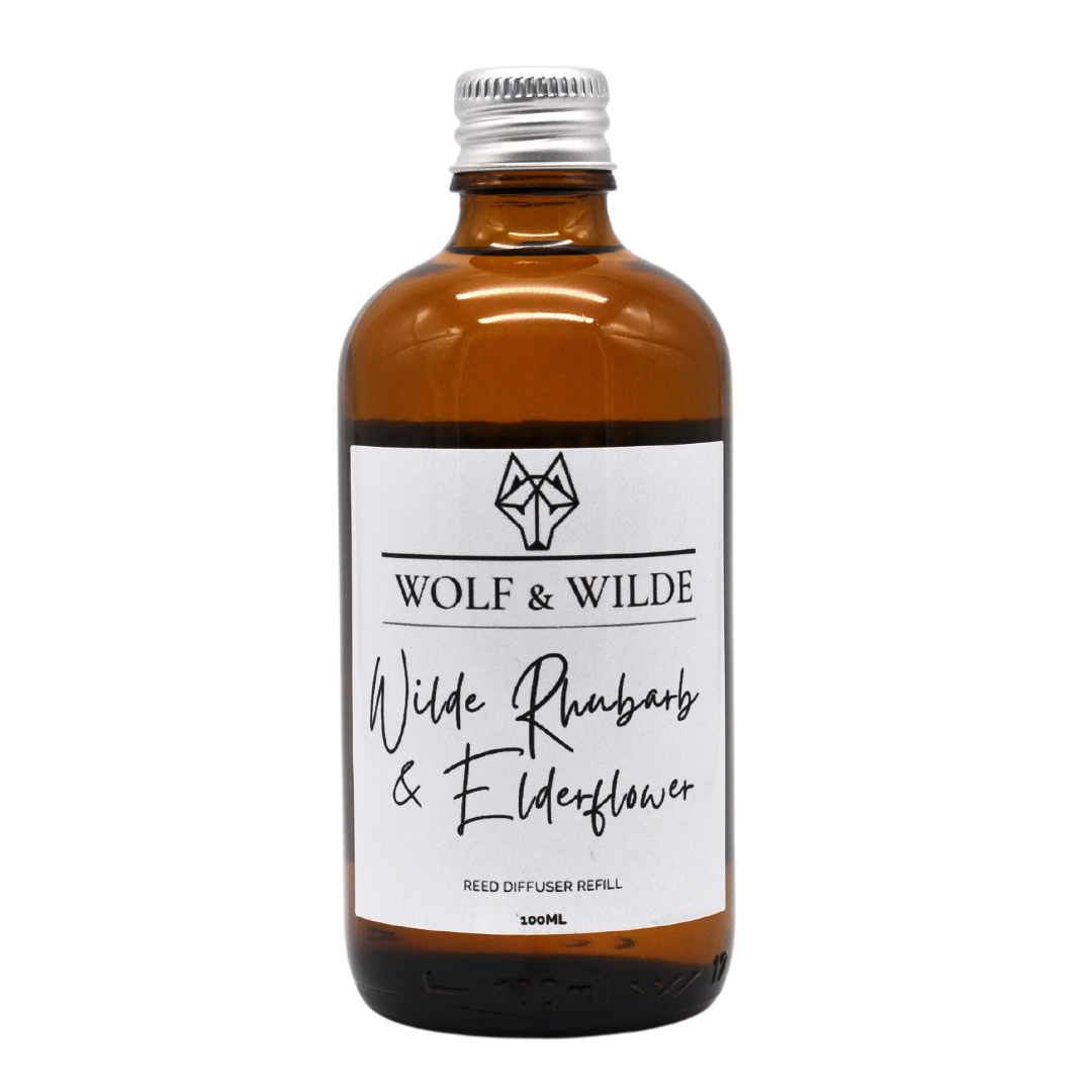 Wilde Rhubarb & Elderflower 100ML Luxury Reed Diffuser Refill in an elegant amber glass bottle with a stylish aluminum cap.