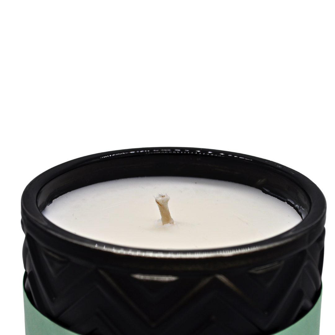 Wilde Seychelles Luxury Aromatherapy Scented Candle with exotic fragrance notes of bergamot, coconut, and vanilla in an elegant jar.