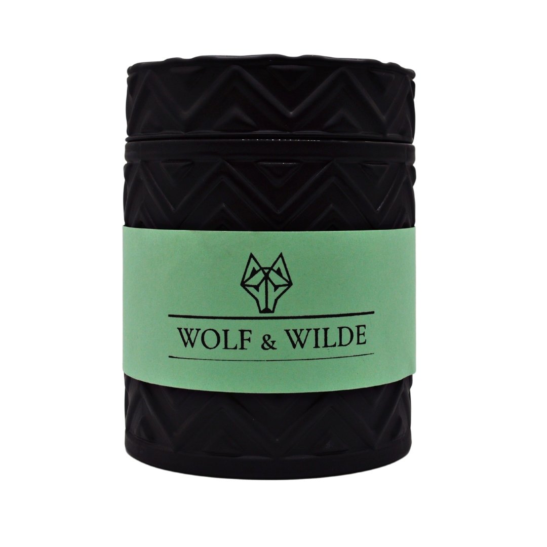 Wilde Seychelles Luxury Aromatherapy Scented Candle with exotic fragrance notes of bergamot, coconut, and vanilla in an elegant jar.