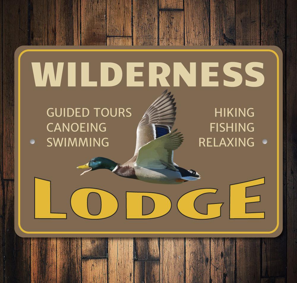 Wilderness Lodge Sign made of high-quality aluminum, featuring a rustic design perfect for home decor.