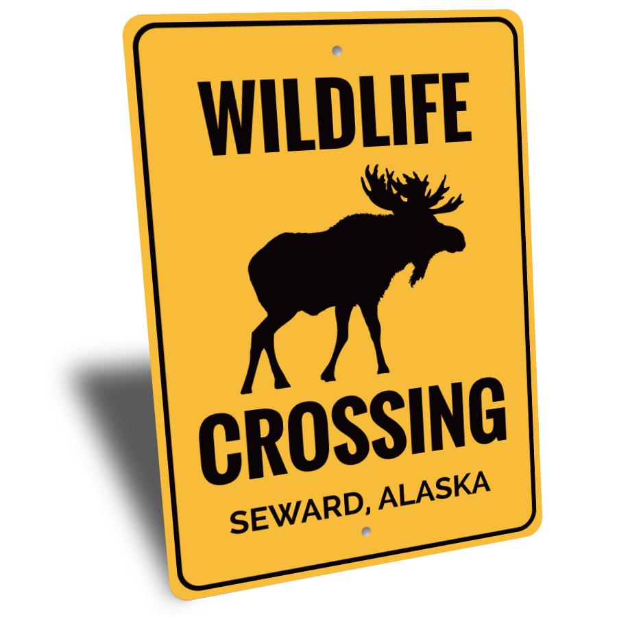 Wildlife Crossing Sign made of durable aluminum, featuring customizable text and pre-drilled holes for easy mounting, perfect for outdoor decor.