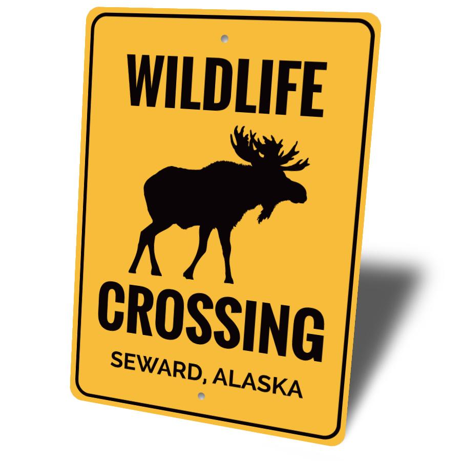 Wildlife Crossing Sign made of durable aluminum, featuring customizable text and pre-drilled holes for easy mounting, perfect for outdoor decor.