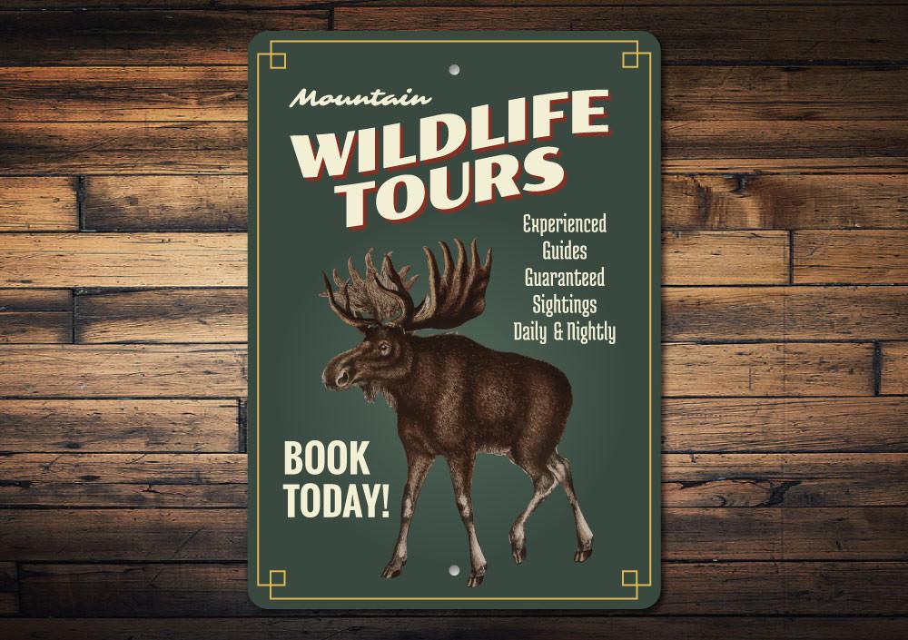 A beautifully crafted Wildlife Tours sign made of durable aluminum, showcasing a scenic lake design, perfect for lakehouse decor.