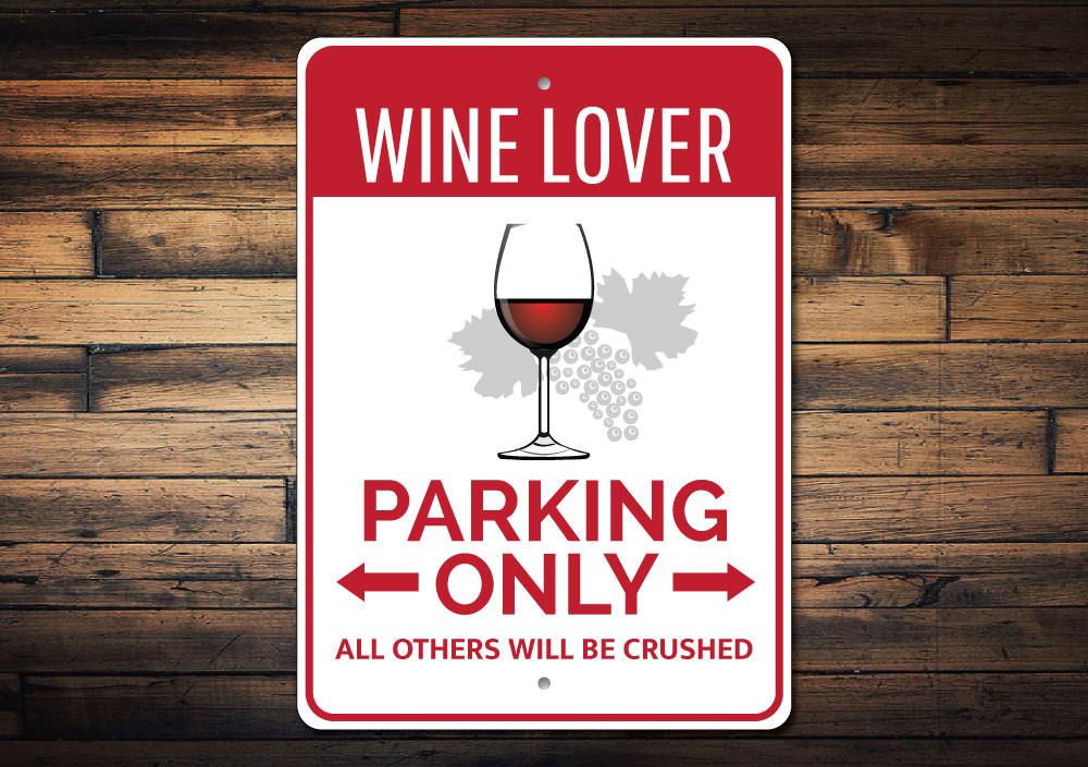 A decorative Wine Lover Parking Sign made of durable aluminum, featuring a wine-themed design, perfect for wine enthusiasts.