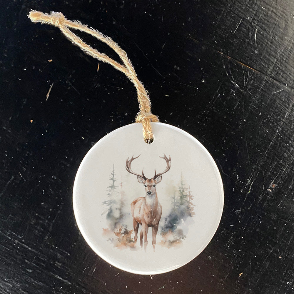 Winter Buck Scene ornament made of high-quality porcelain, featuring a detailed winter design, perfect for holiday decor or gifting.