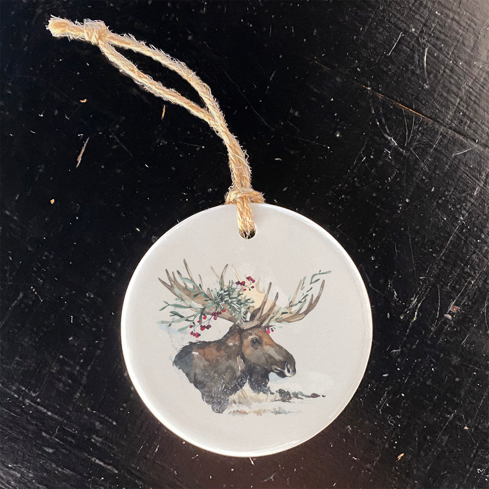 Winter Moose Ornament made of high-quality porcelain with a vibrant design, perfect for holiday decor or gifting.