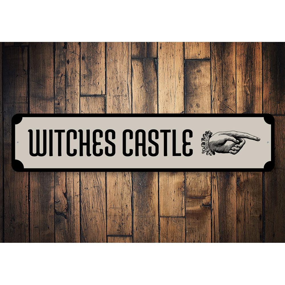 A spooky Witch's Castle Sign made of durable aluminum, featuring eerie graphics perfect for Halloween decorations.