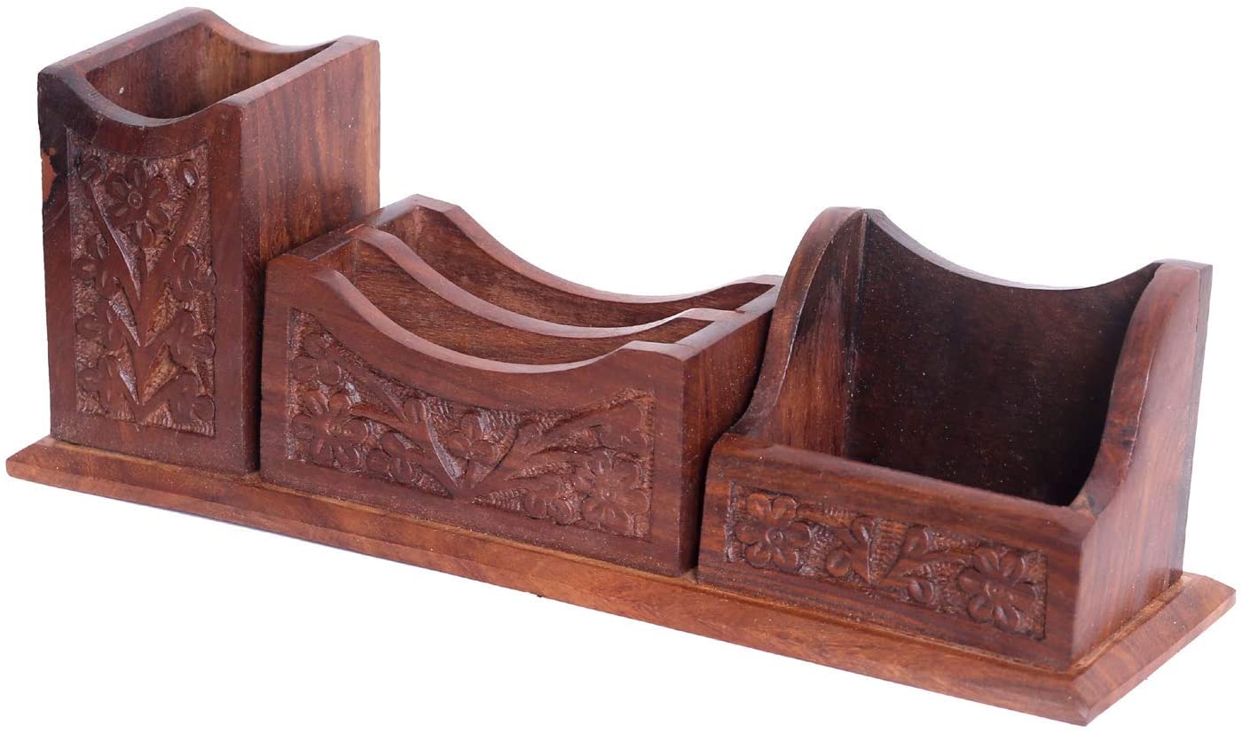 A beautifully carved wooden desk organizer made of pure rosewood, featuring compartments for pens, a mobile phone, and notes.