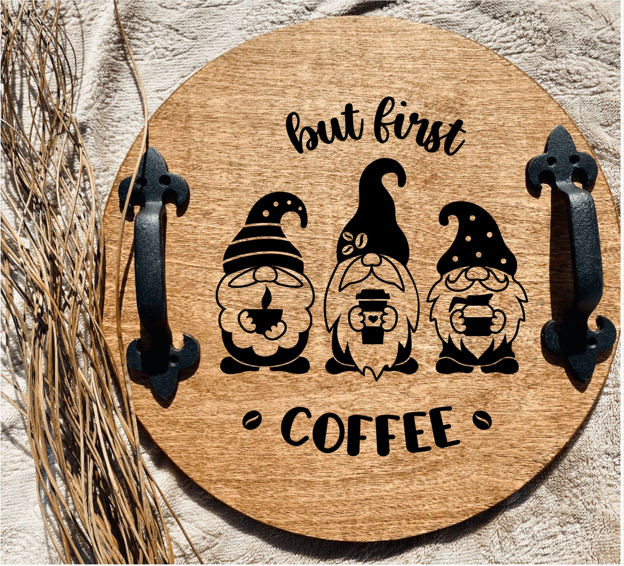 Handmade wooden serving tray with gnome design and 'But First Coffee' phrase, featuring black metal handles and customizable stain options.