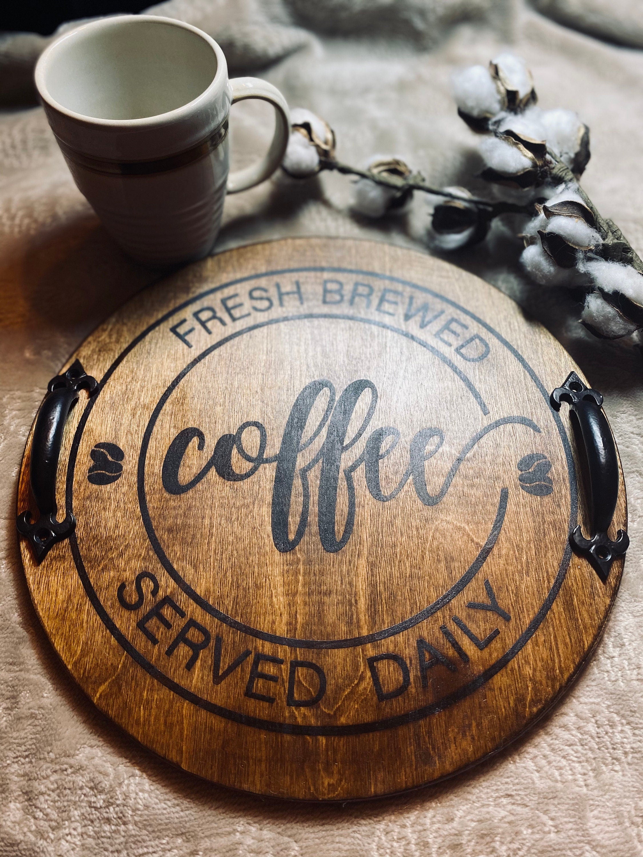 Handmade round wooden tray with dark Chestnut stain, featuring optional handles and unique wood grain patterns.