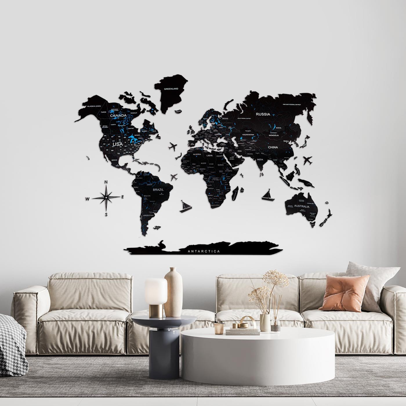 A beautifully crafted Wooden World Map in white, made from birch plywood, showcasing detailed geographical features and decorative elements.