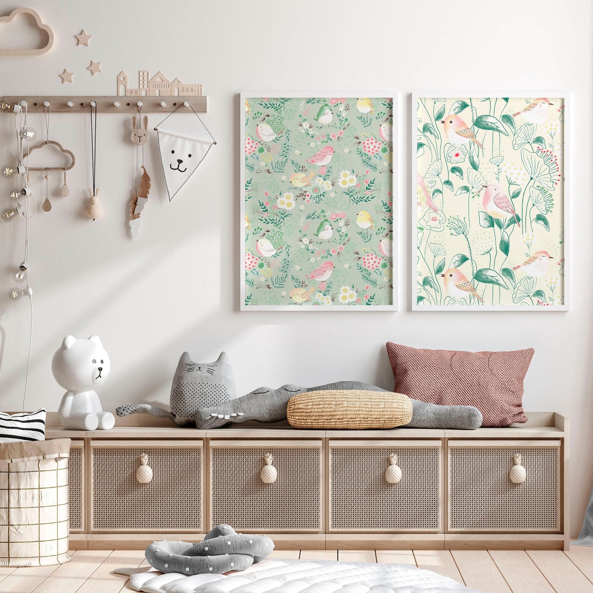 Set of 2 woodland nursery wall art prints featuring whimsical birds and flowers in soft pink, ivory, and sage green tones.