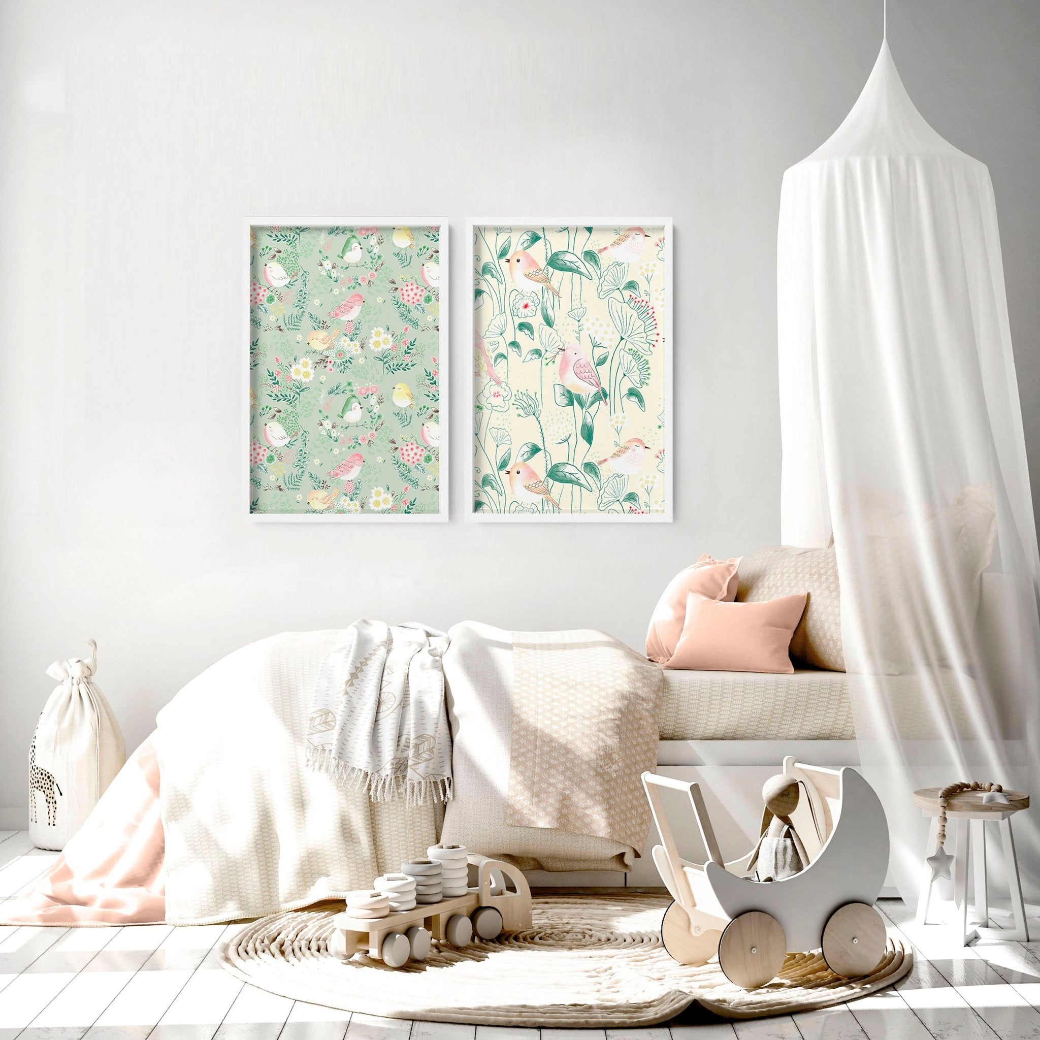 Set of 2 woodland nursery wall art prints featuring whimsical birds and flowers in soft pink, ivory, and sage green tones.