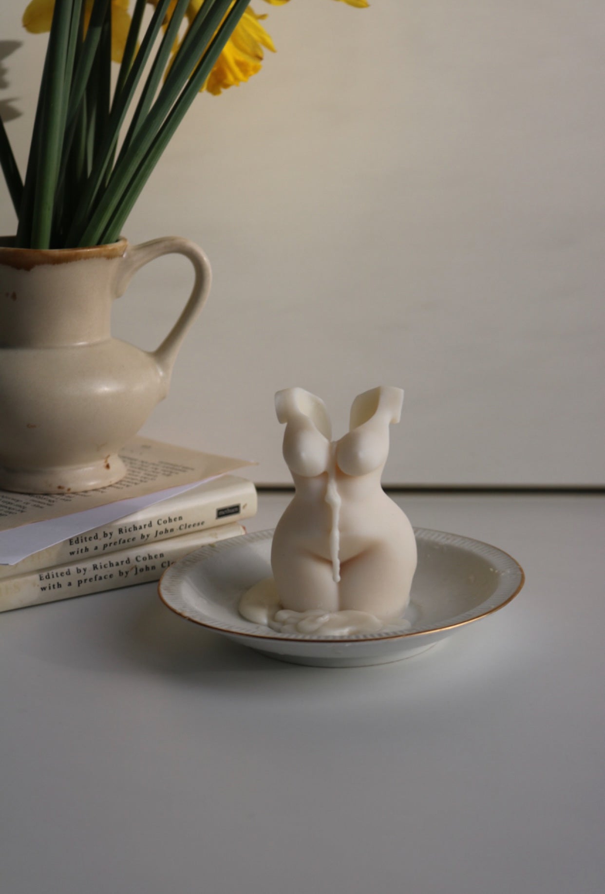 A beautifully crafted Woman Torso Candle made from a soy wax blend, showcasing its sculptural design and elegant form.