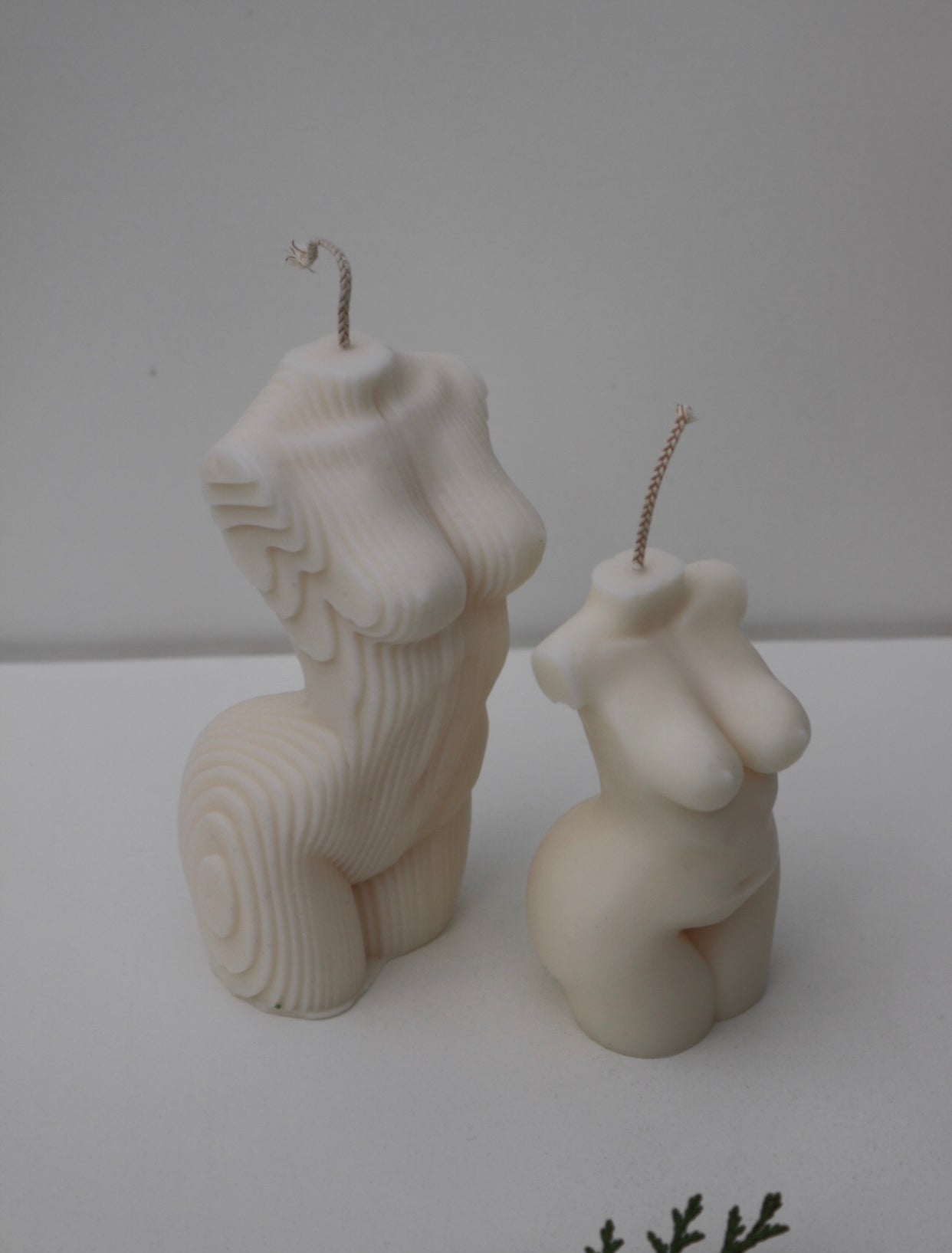 A beautifully crafted Woman Torso Candle made from a soy wax blend, showcasing its sculptural design and elegant form.