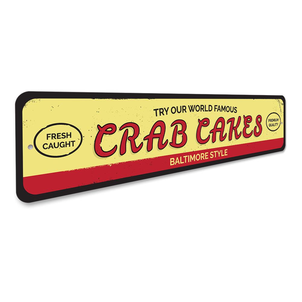 A decorative World Famous Crab Cakes Sign made of aluminum, featuring vibrant colors and customizable text, perfect for beach-themed decor.