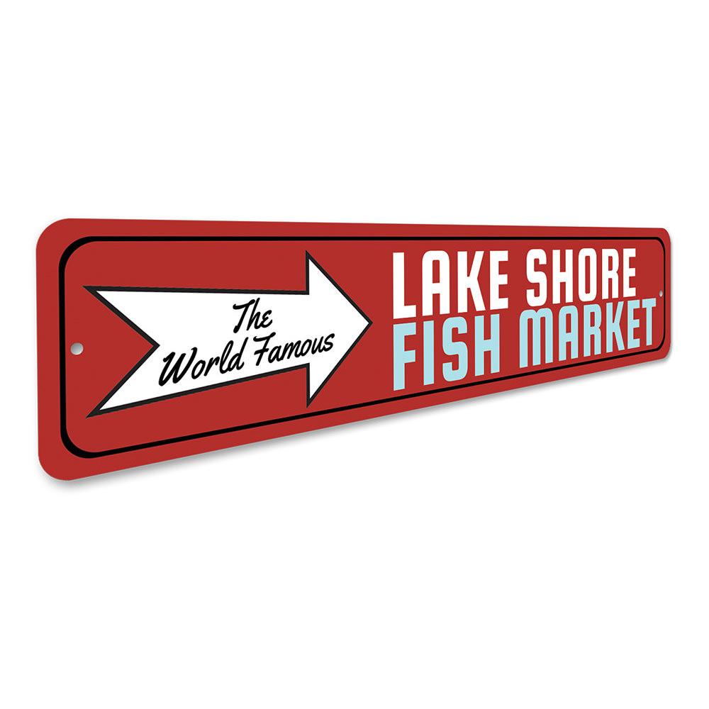 A decorative aluminum sign featuring the World Famous Fish Market design, showcasing vibrant colors and customizable text options, perfect for lakehouse decor.