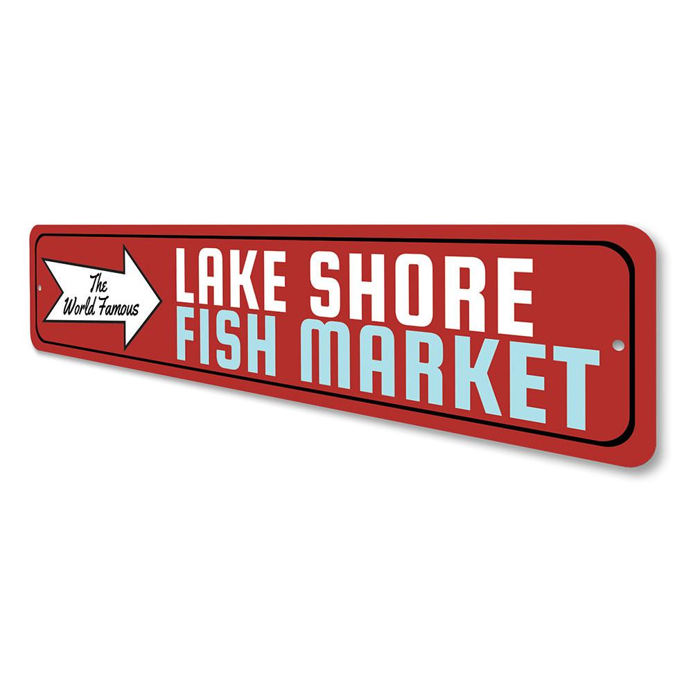 A decorative aluminum sign featuring the World Famous Fish Market design, showcasing vibrant colors and customizable text options, perfect for lakehouse decor.