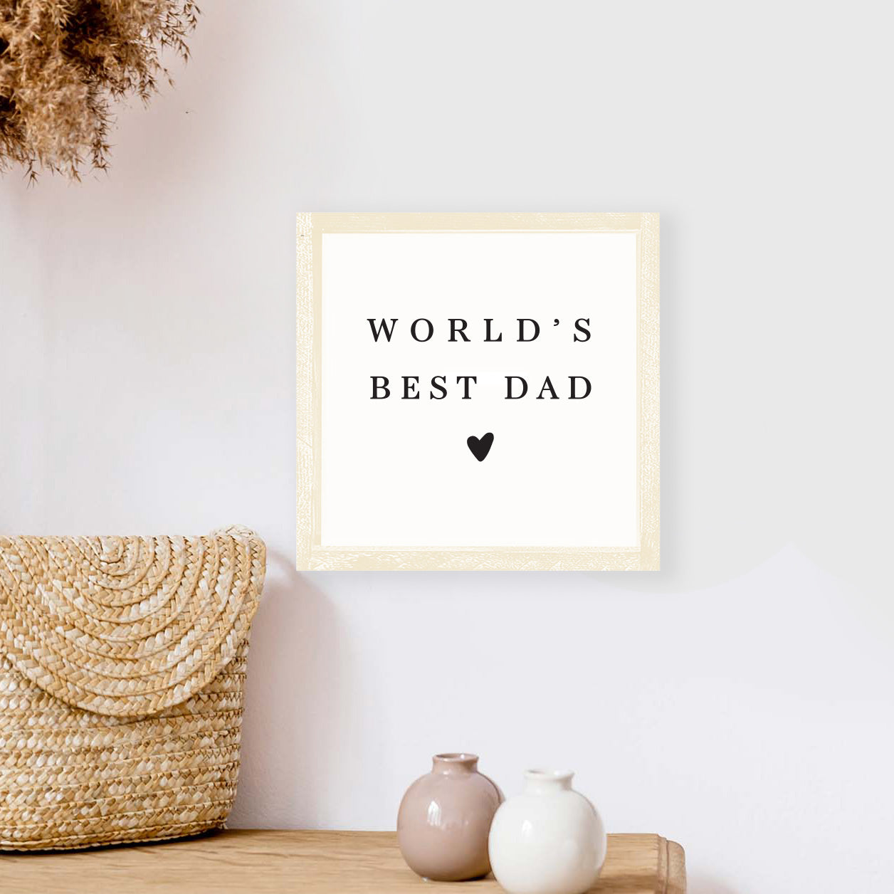 A beautifully crafted 8x8 inch wood sign that reads 'World's Best Dad', featuring a rustic pine wood frame and a white background.