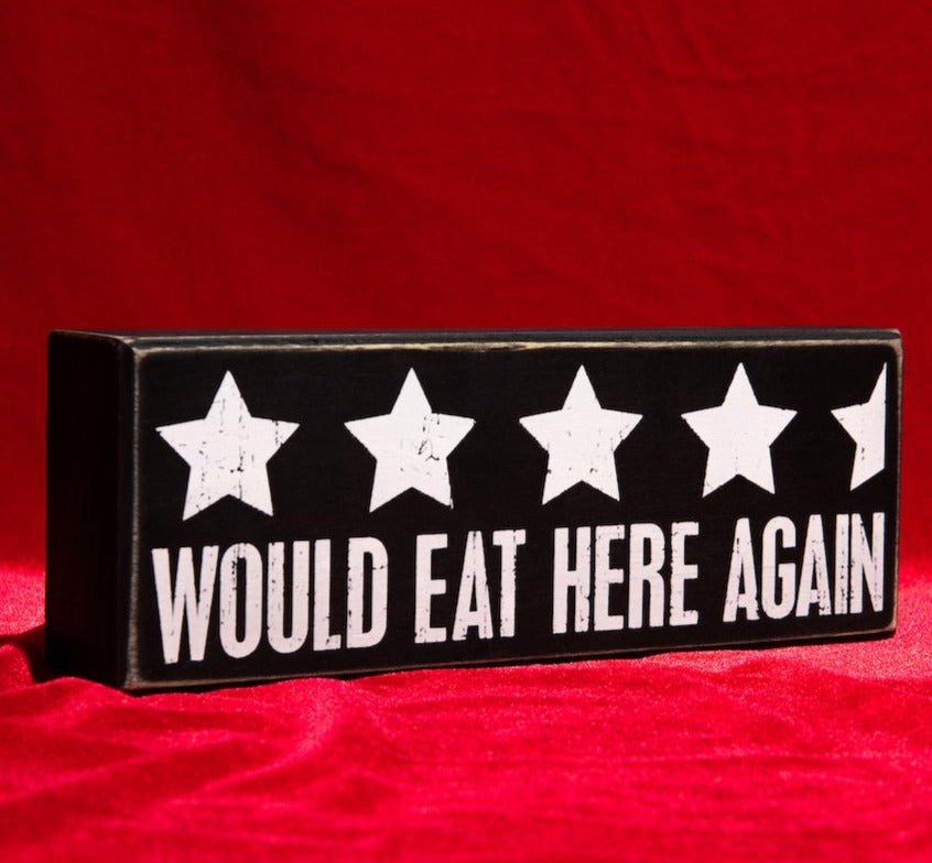 A stylish wooden box sign with a black and white design featuring the phrase 'Would Eat Here Again' and a 4.5-star rating.