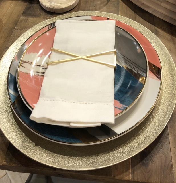 X Wrap Matte Gold napkin wraps featuring a unique design and elegant matte finish, perfect for enhancing table decor.