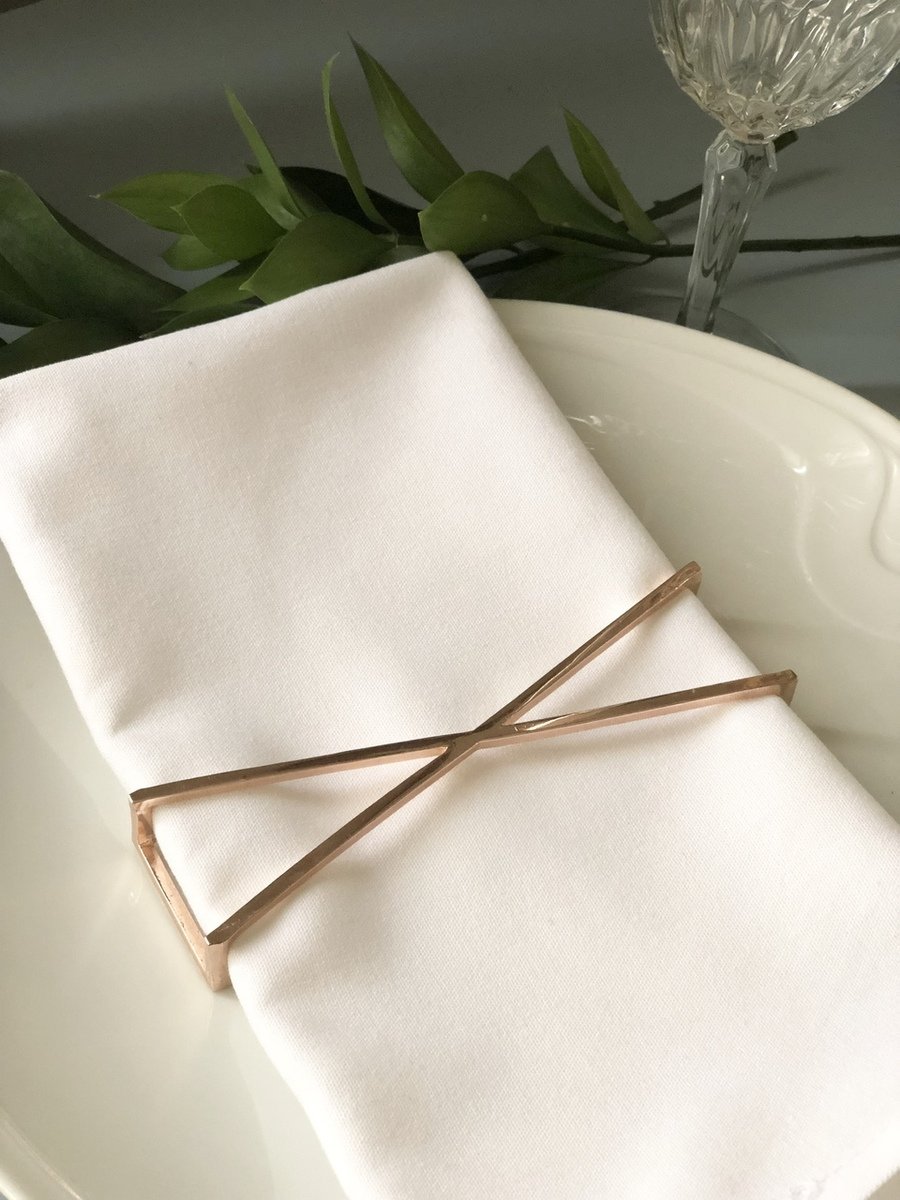 X Wrap Napkin Wrap in Rose Gold, elegantly designed for stylish dining.