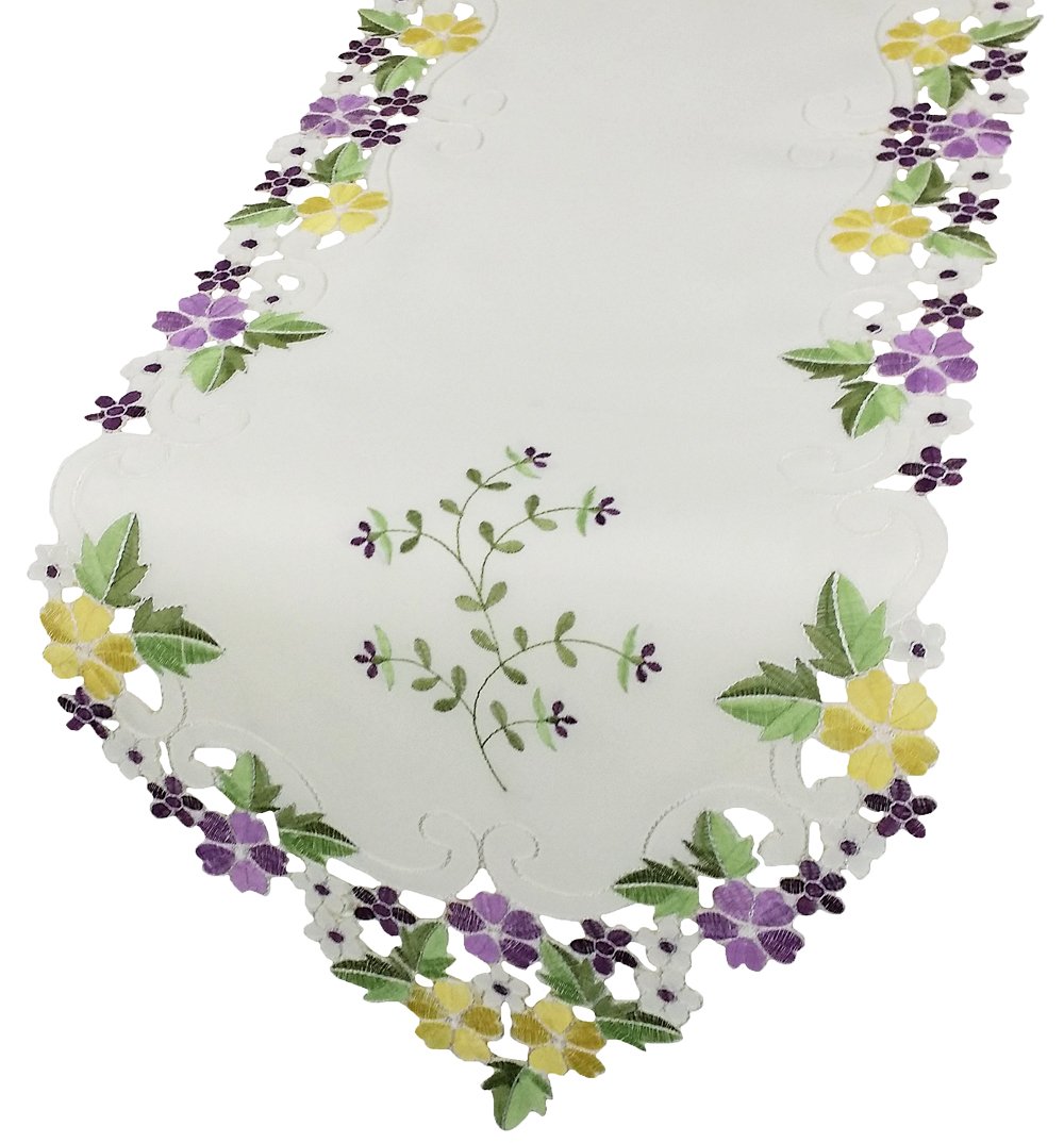 Colorful embroidered floral table runner with intricate cutwork design, available in purple, pink, and blue.