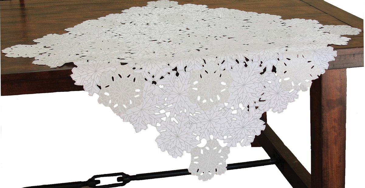 XD10816 Shimmer Snowflake Table Topper featuring intricate snowflake cutwork design, perfect for holiday dining decor.