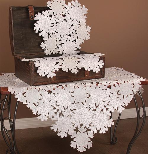 XD10816 Shimmer Snowflake Table Topper featuring intricate snowflake cutwork design, perfect for holiday dining decor.