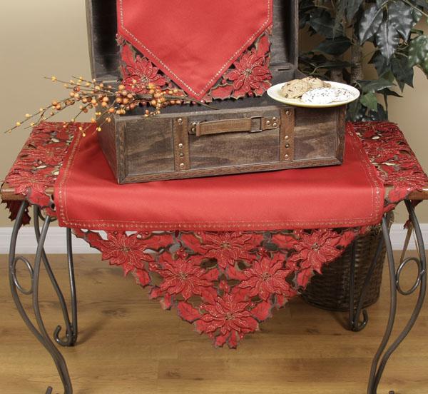 XD10982 Holiday Spirit Table Topper featuring intricate poinsettia embroidery and cutwork, perfect for Christmas decor.