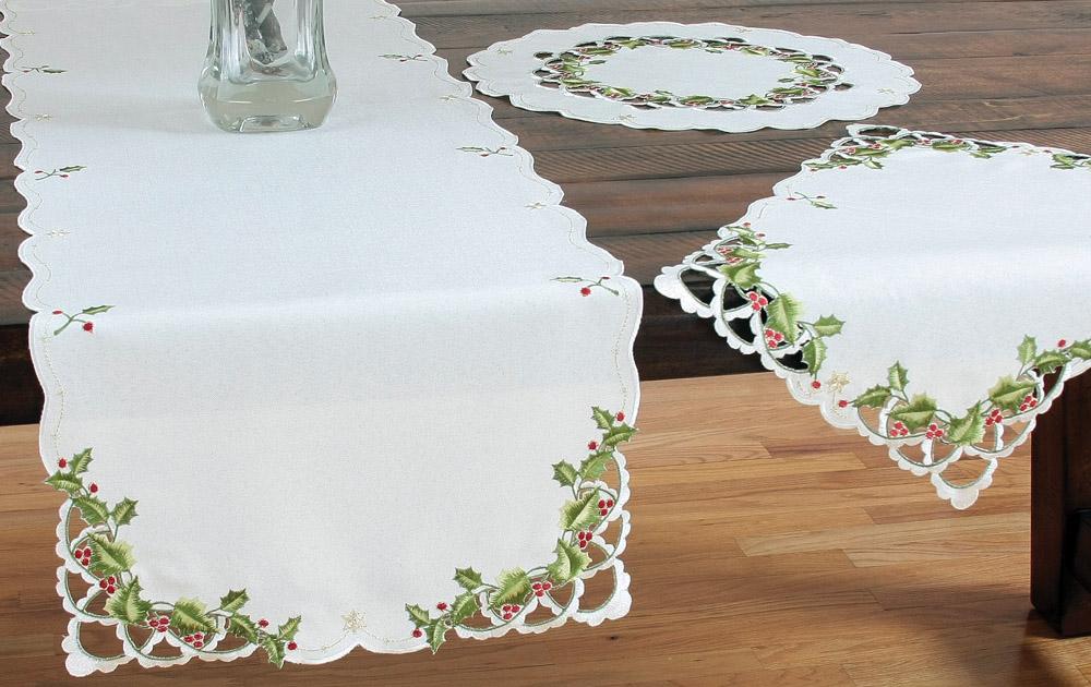 Set of 4 XD13188 Winter Berry Placemats featuring embroidered holly berries on an off-white background with elegant cutwork.