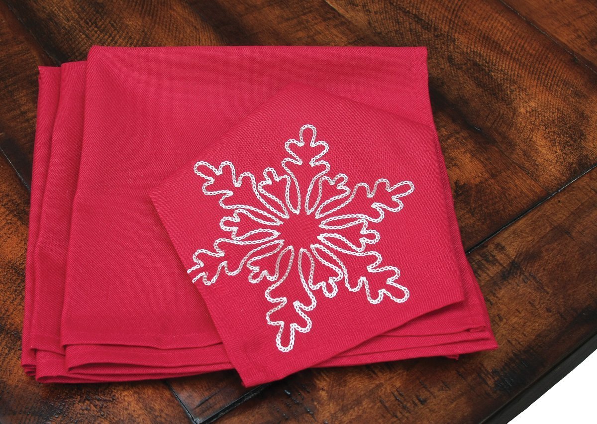 Set of 4 XD14103 Snowflake Napkins with intricate snowflake embroidery on a classic red background, perfect for holiday dining.