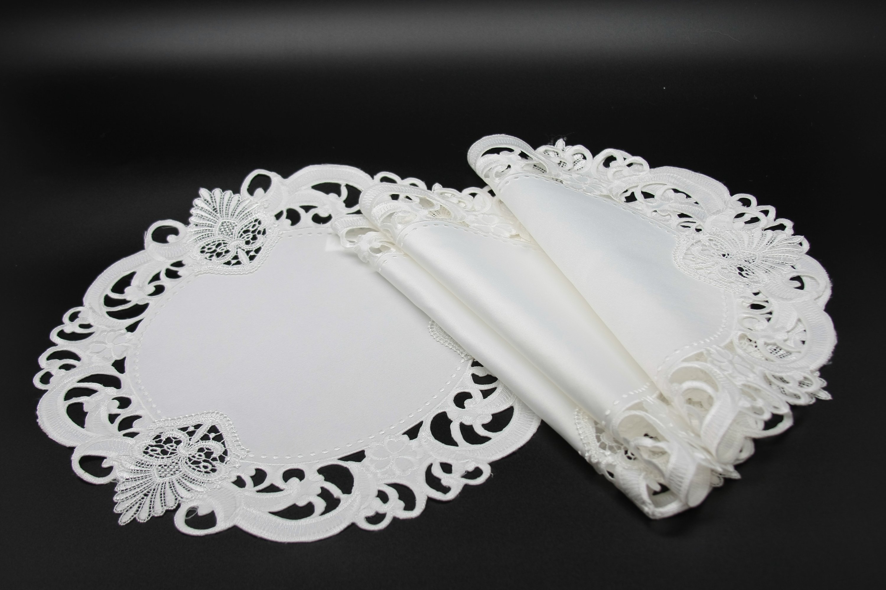 Set of 4 XD170185 Delicate Lace Doilies featuring intricate floral cutwork on a white background, perfect for elegant table settings.